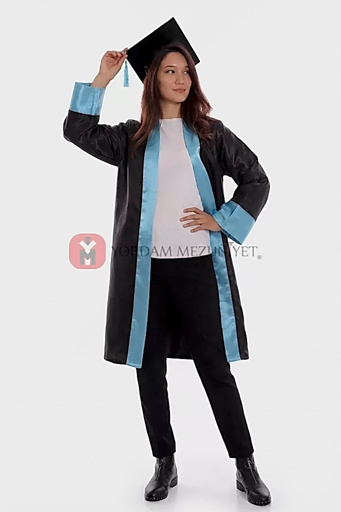 Graduate in cap and gown pose